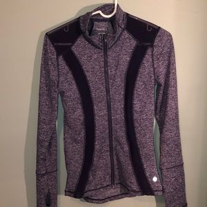 Deep blue athletic jacket with sheer cutouts